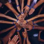 Hands in team setting